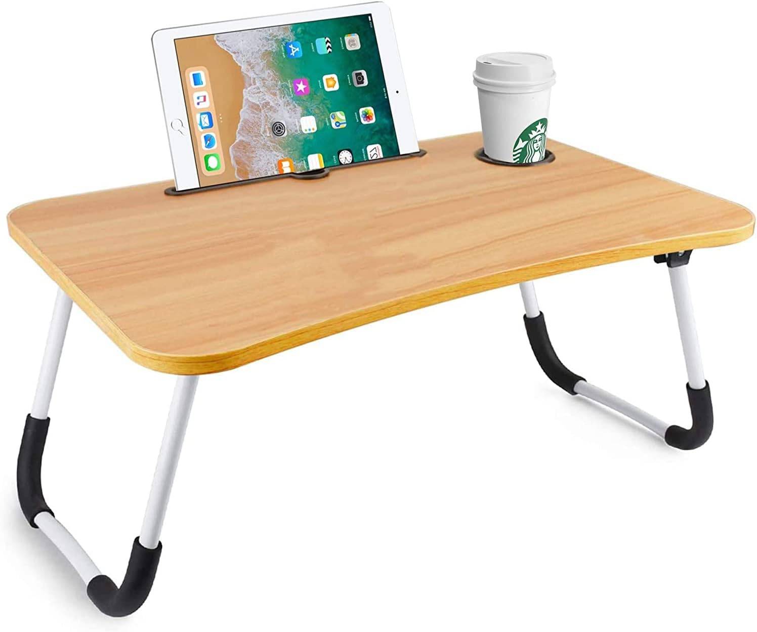 Foldable laptop table with hole