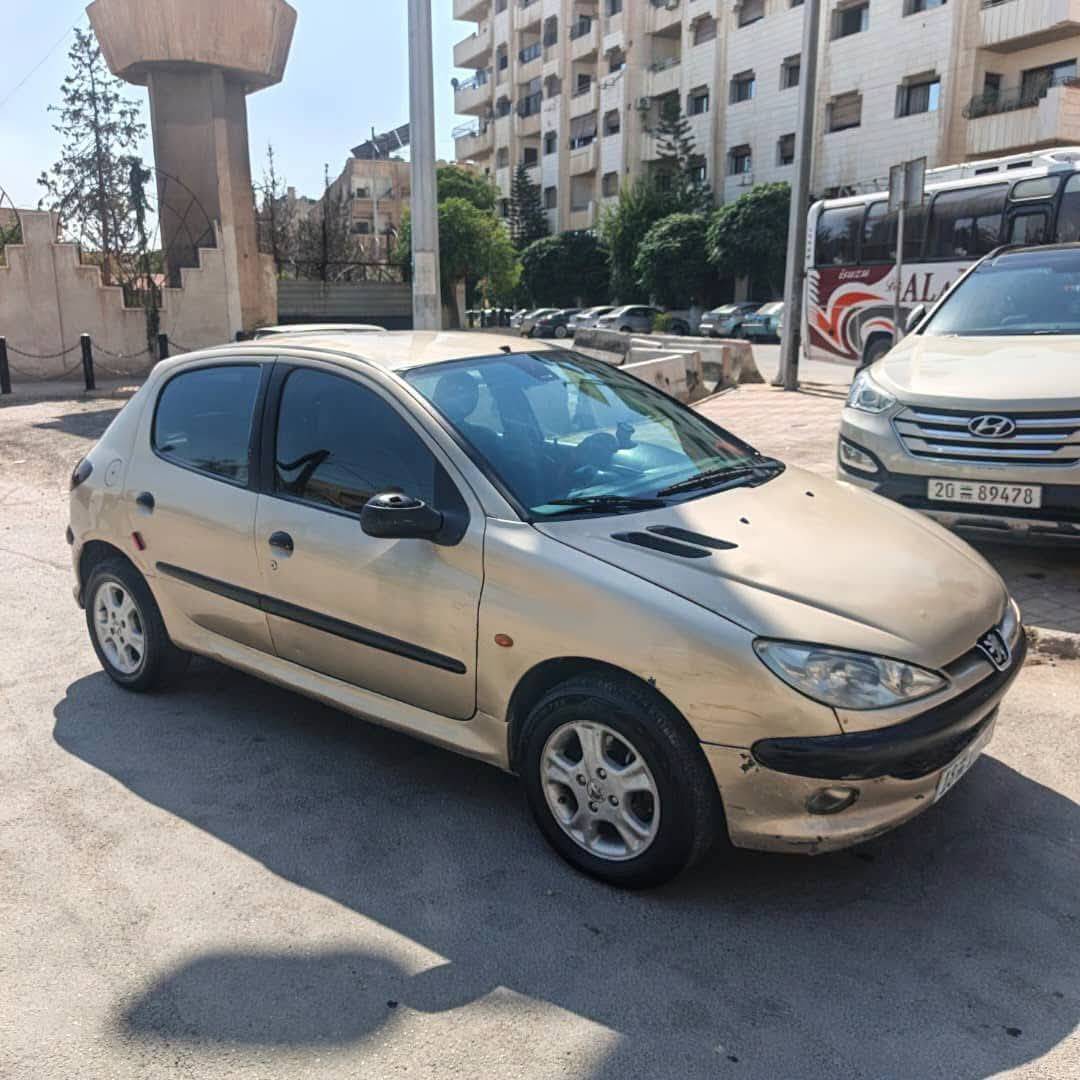 بيجو 2003