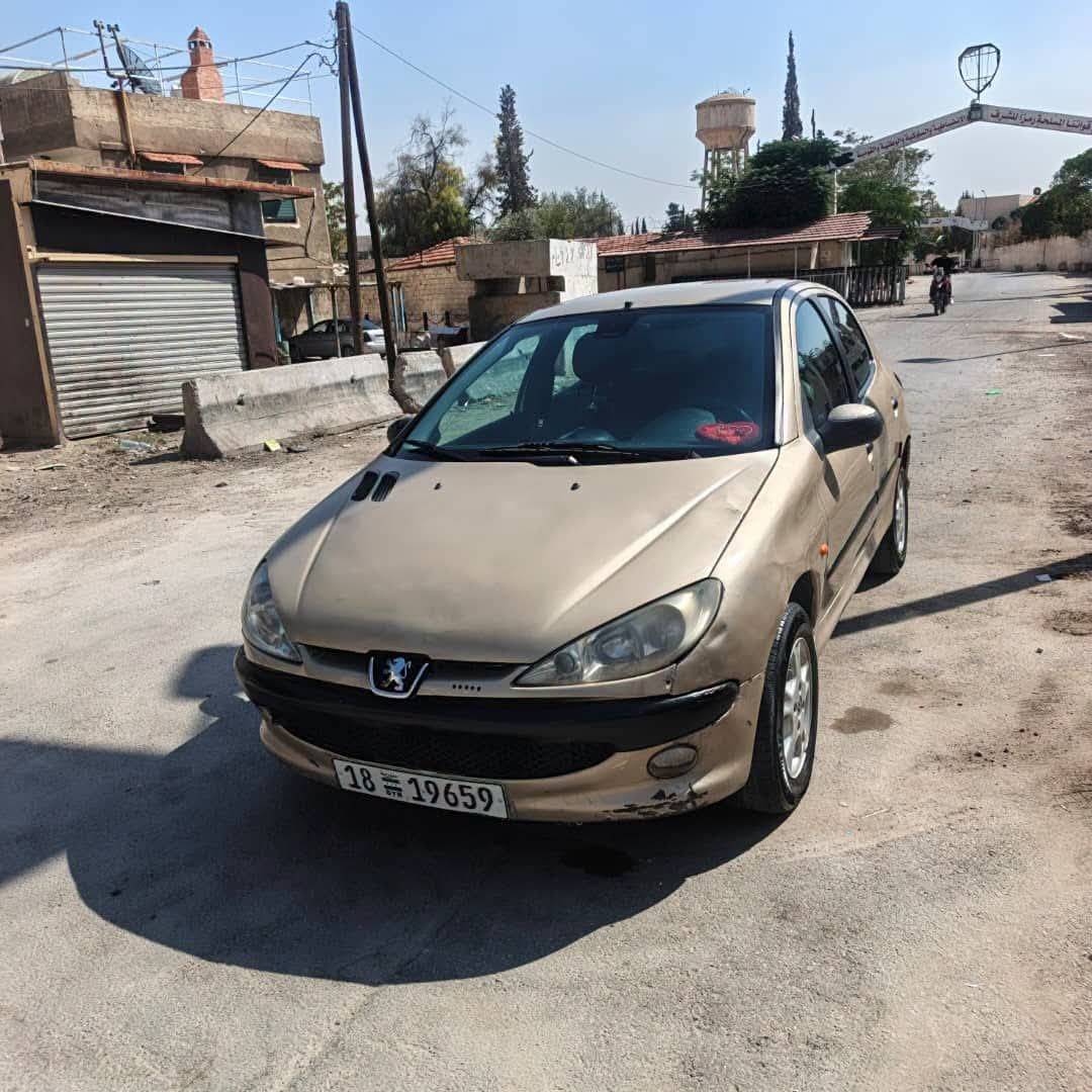 بيجو 2003
